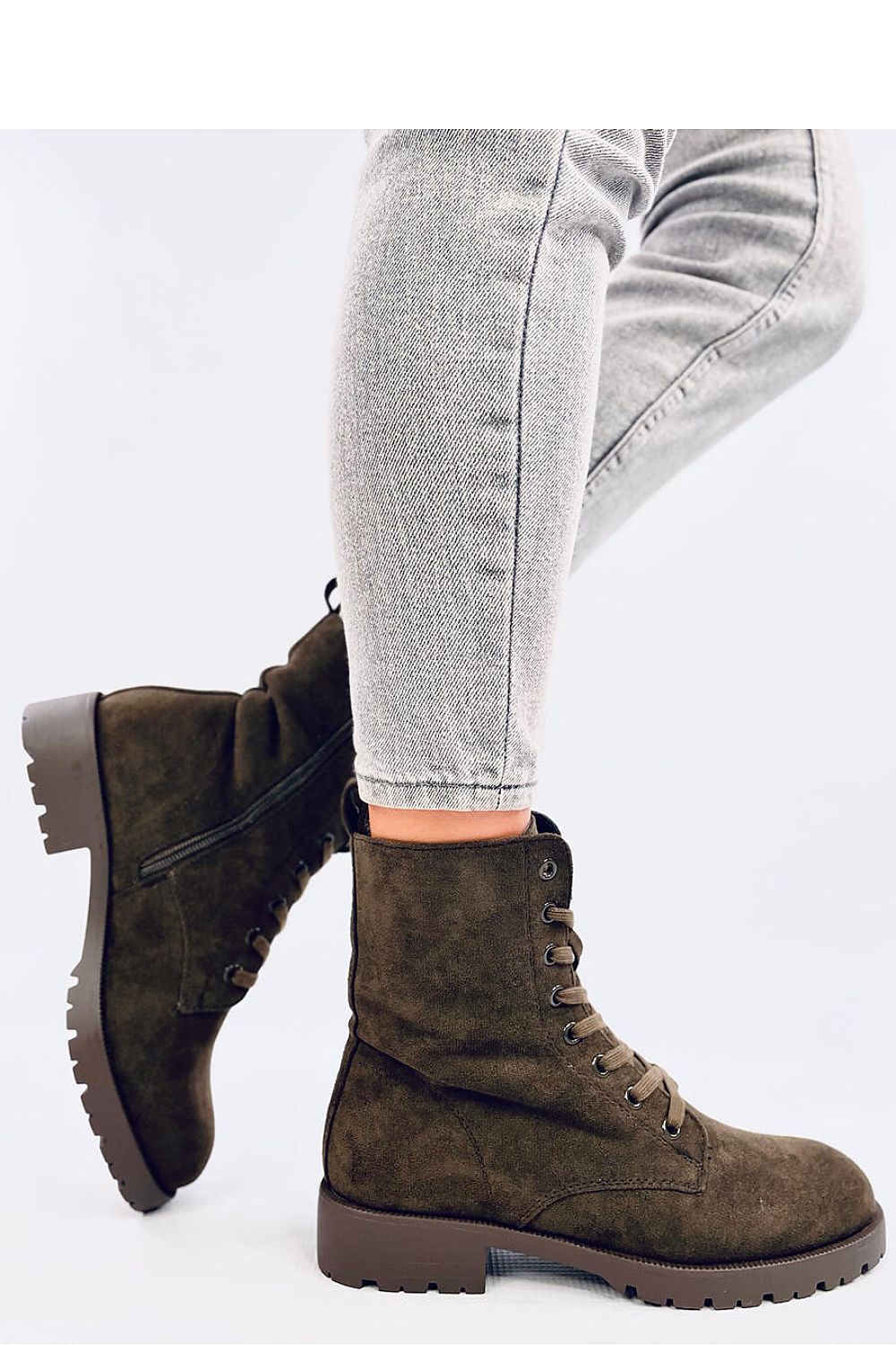 Inello women's eco-suede booties with side zipper and lacing, featuring a luxurious soft fur lining for ultimate comfort in winter style.