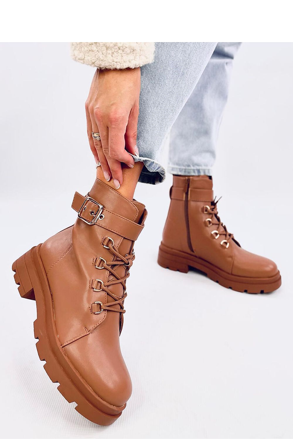 Luxury women's lace-up military style boots with side zipper and soft fur lining by Inello, featuring a high sole and stylish design.