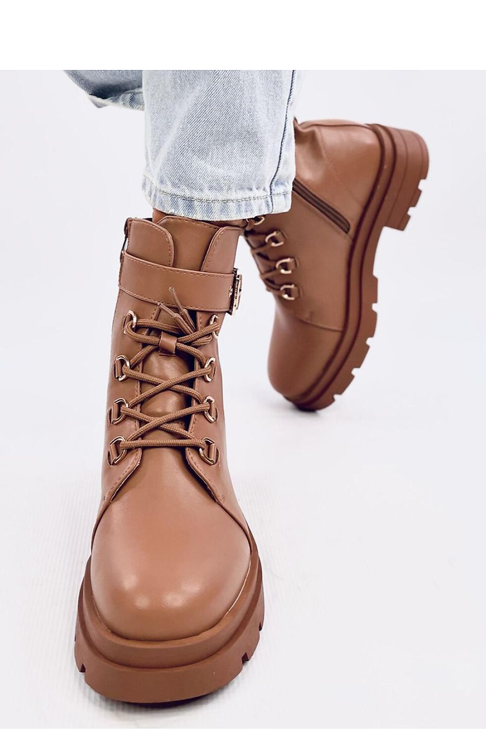 Close-up view of Inello's luxury women's lace-up military boots showcasing the artificial leather material and soft fur interior lining.