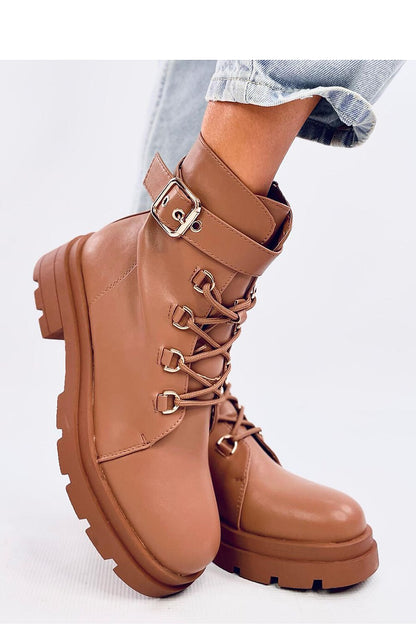 Elegant display of Inello's women's military style boots highlighting the beautiful lace-up design and practical side zipper for easy wear.