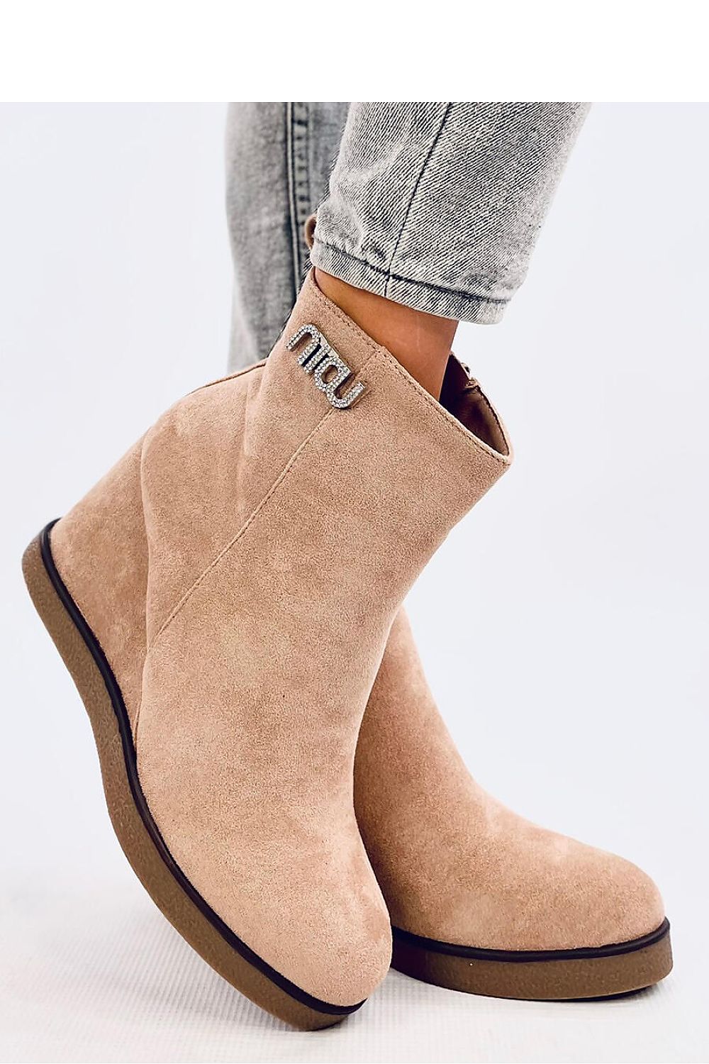 Side view of elegant women's buskin boots by Inello, highlighting the 9 cm heel and intricate zircon embellishments on eco-suede fabric.