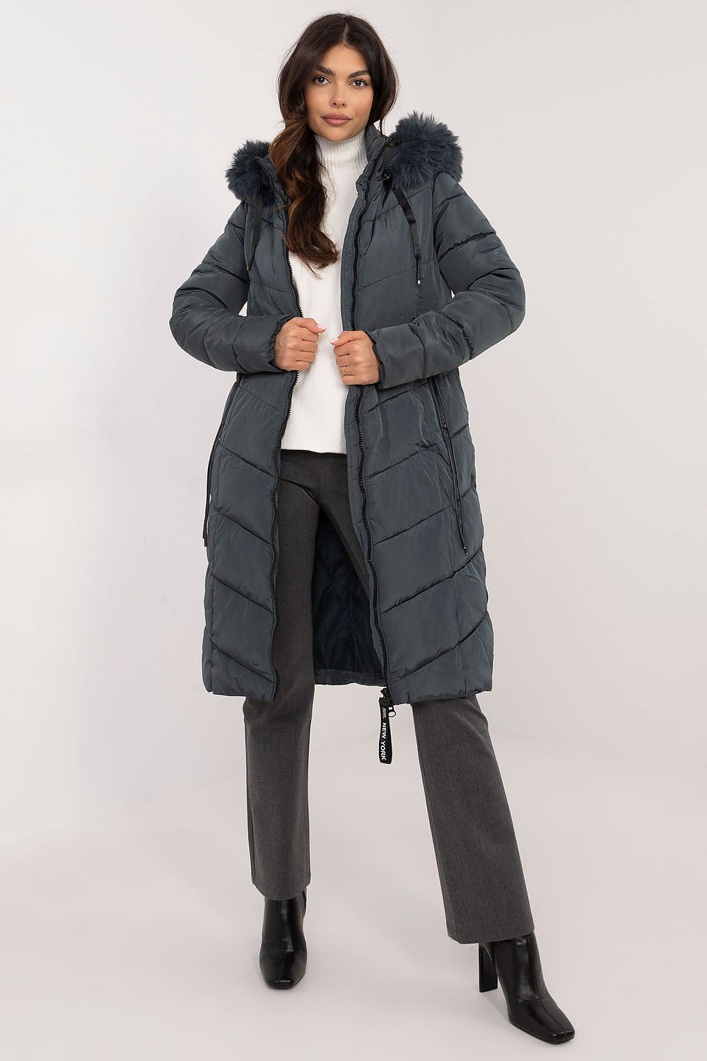 Sophisticated long down jacket showcasing a chic quilted design, available from Factory Price for fashion-forward winter wear.
