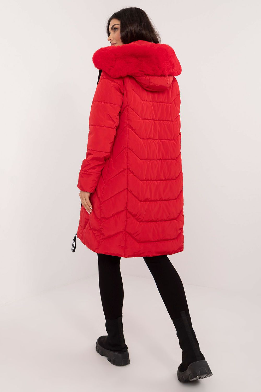 Sophisticated women's down jacket showcasing quilted texture, effortlessly matching various outfits from Factory Price.