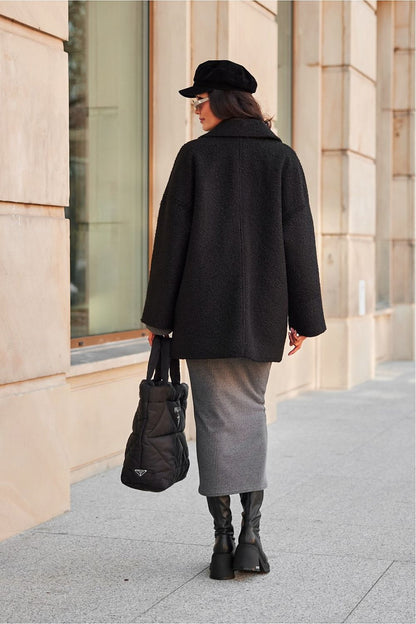Roco Fashion Camila Jacket draped on a model, exemplifying its elegant collar and beautiful fit, ideal for both everyday and formal attire.