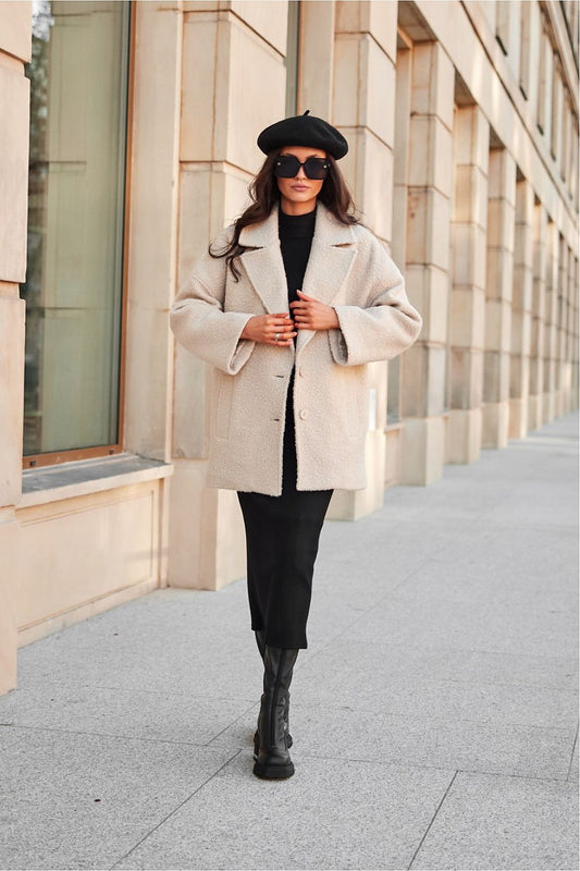 Elegant Camila Quilted Jacket by Roco Fashion, featuring an insulated lining and chic pockets, ideal for fashionable layering during cold seasons.