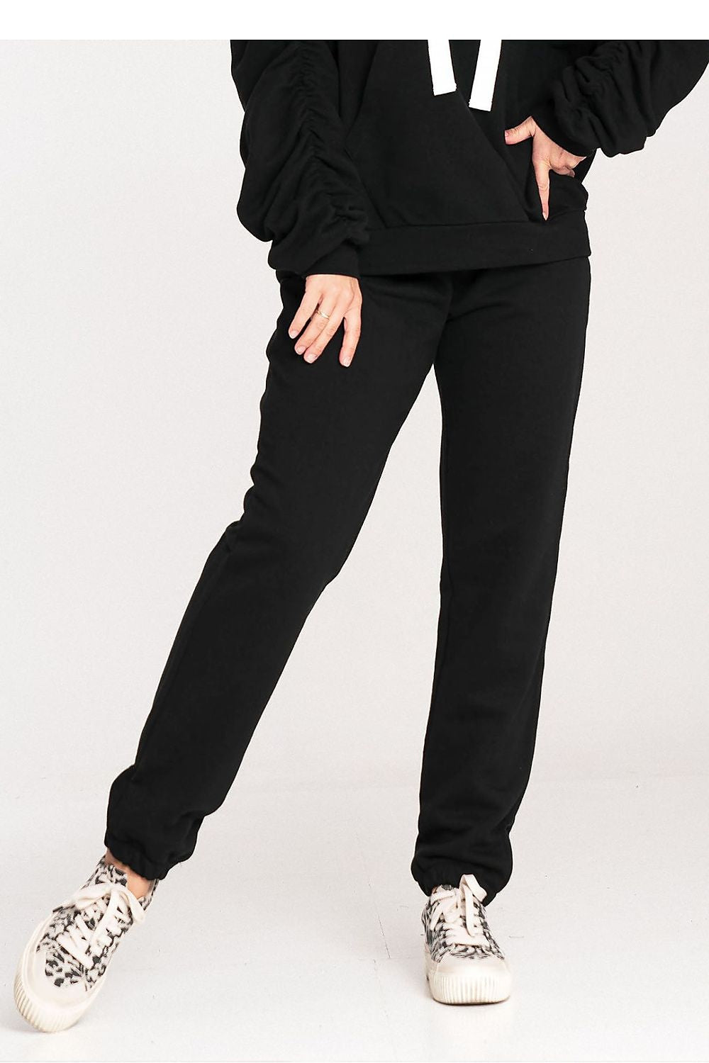 Elegant Figl cotton sweatpants featuring a wide elastic waistband, designed for luxurious comfort and style.