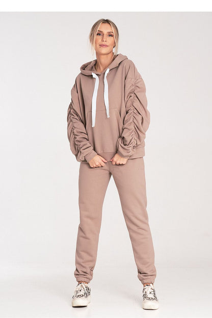 Chic Figl cotton sweatpants featuring a wide elastic waistband, perfect for stylish lounging or casual outings.