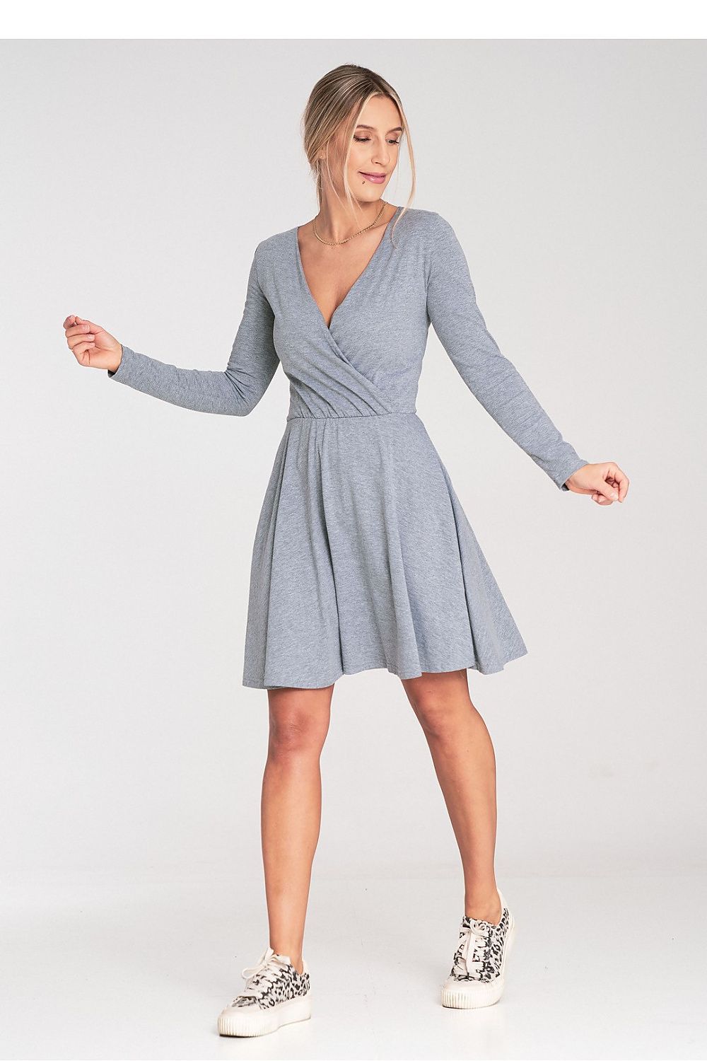 Luxurious Figl cotton dress featuring long sleeves, flared hem, and elegant envelope neckline, perfect for sophisticated occasions.