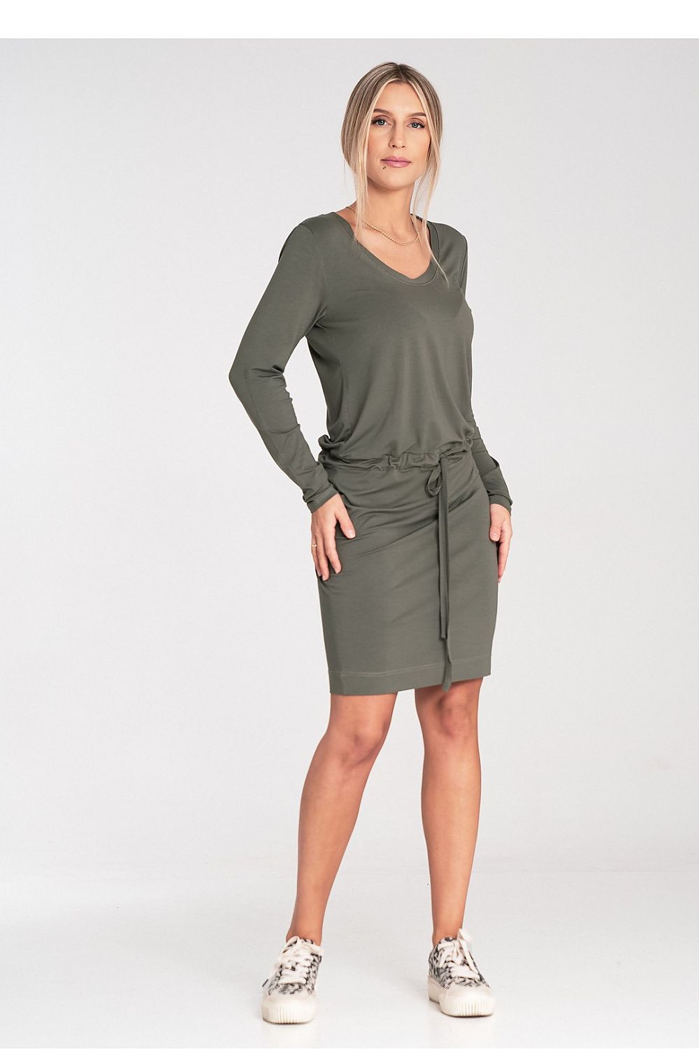 Figl long sleeve dress in elegant design, demonstrating a timeless half-round neckline and stylish ties, perfect for upscale daytime events.