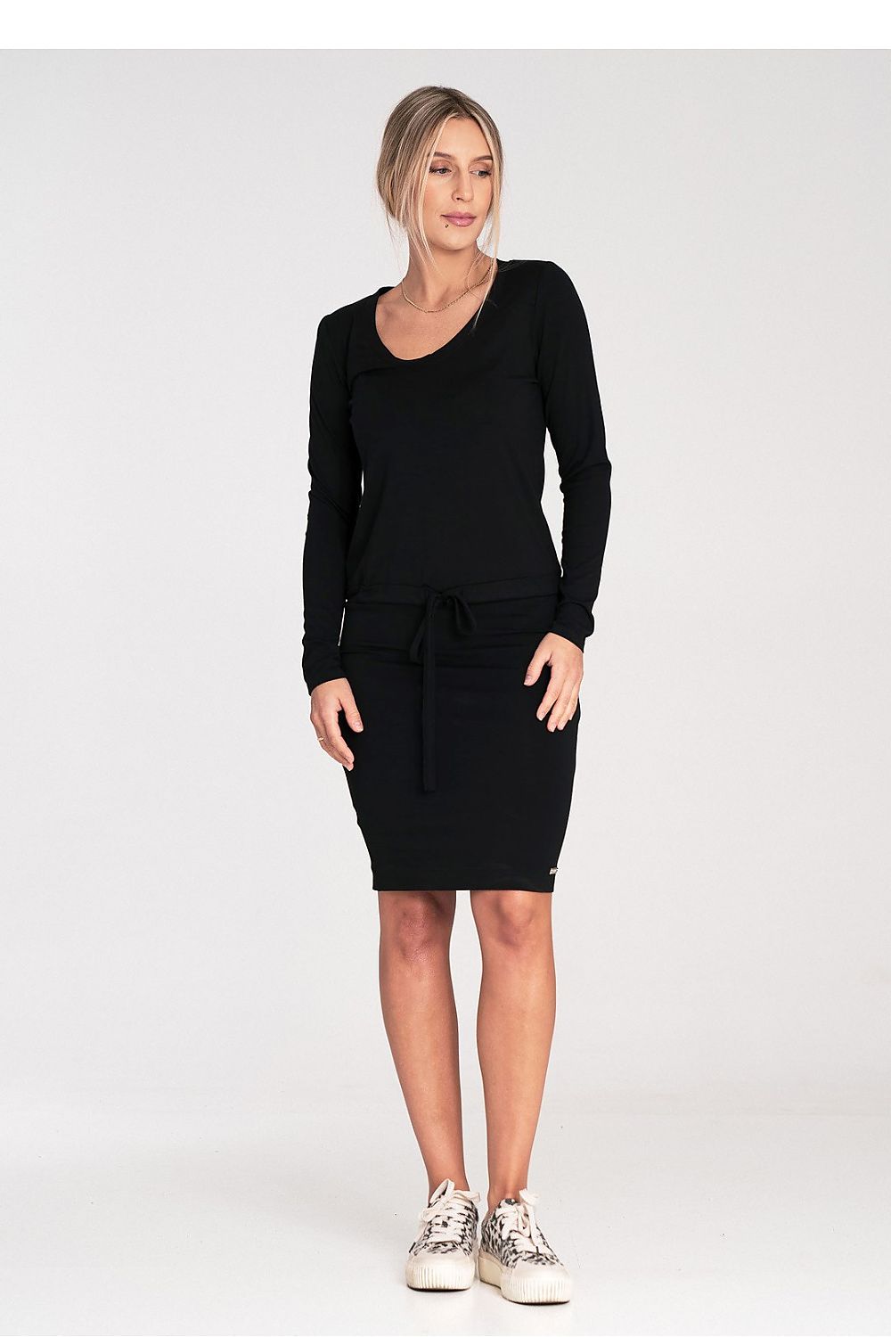 Sophisticated Figl daydress featuring long sleeves, a flattering half-round neckline, and ties at the waist, embodying classic elegance.