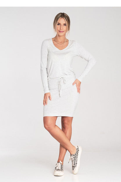 Elegant Figl daydress featuring long sleeves and a half-round neckline, complemented by stylish waist ties, perfect for a luxurious and sophisticated look.