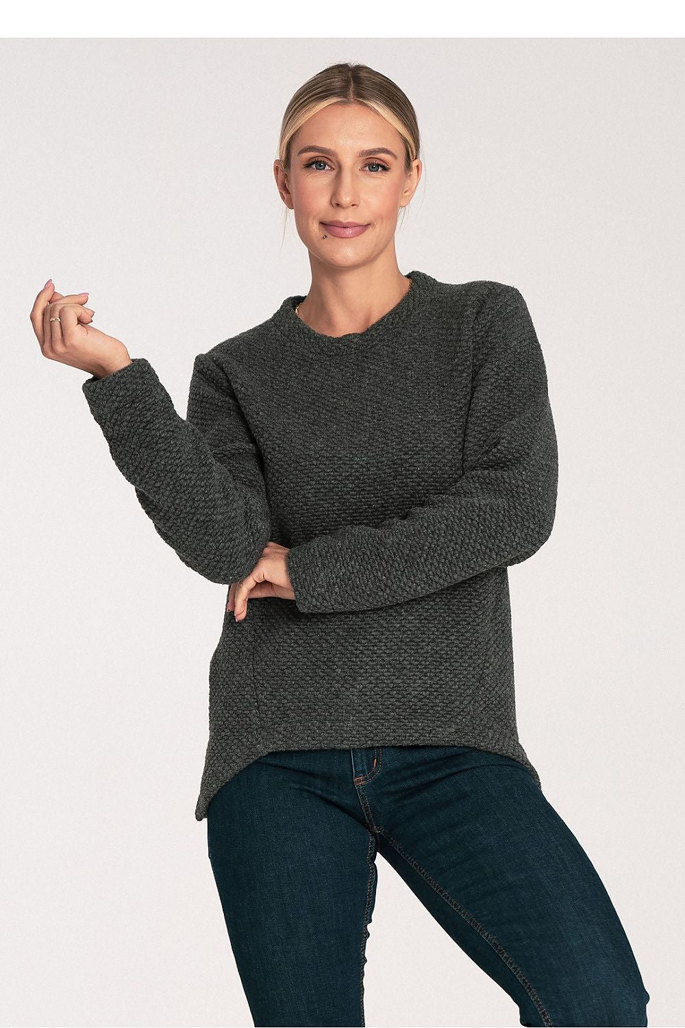 Luxurious Figl asymmetrical sweater featuring long sleeves and a round neckline, perfect for chic winter styling.