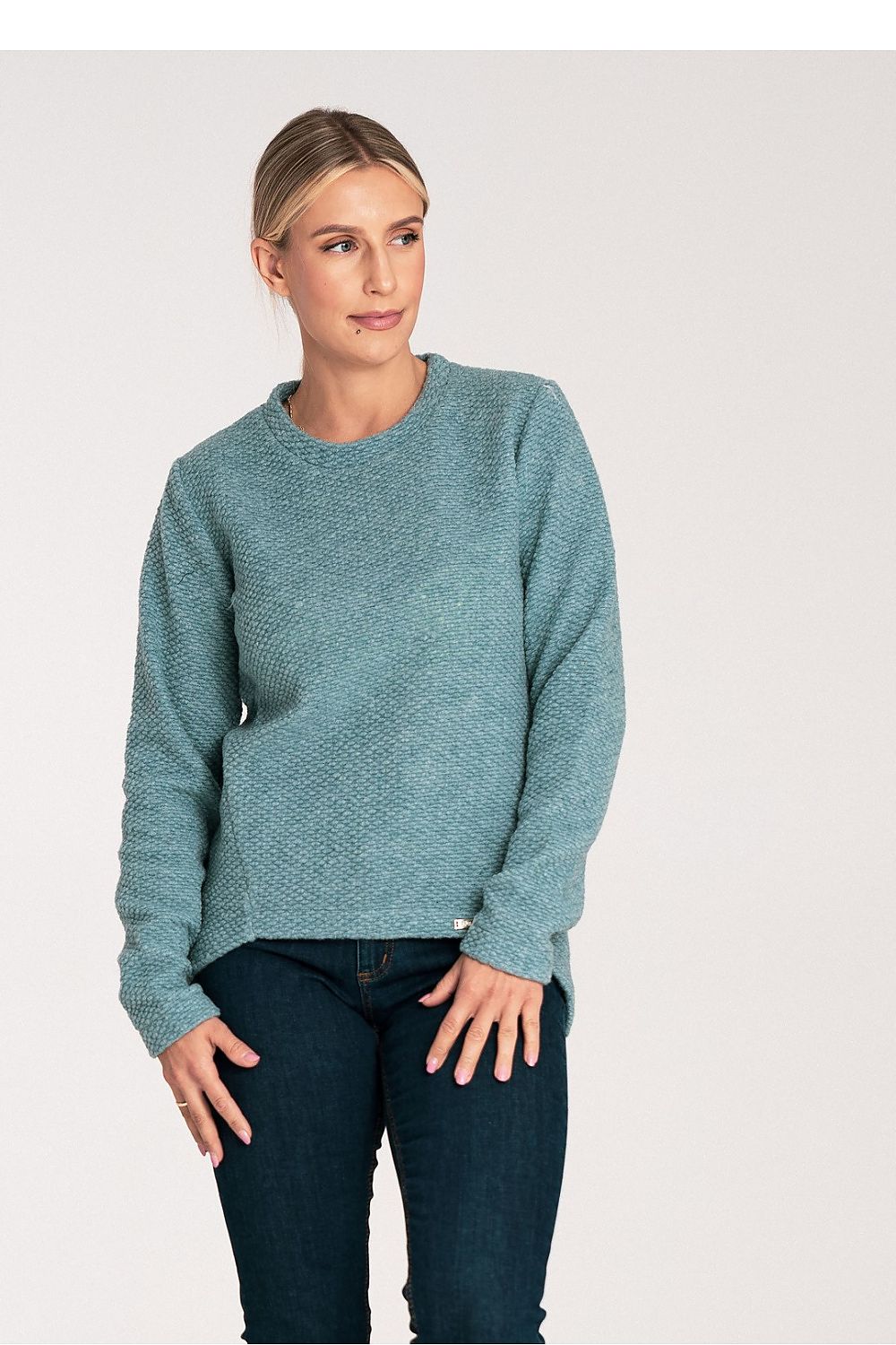 Fashion-forward Figl sweater with an asymmetrical hem, expertly crafted for a luxurious feel and contemporary look.