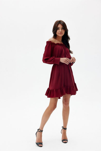 Roco Fashion daydress with elegant long sleeves and unique ruffle detail, illustrating its sophisticated and feminine charm.