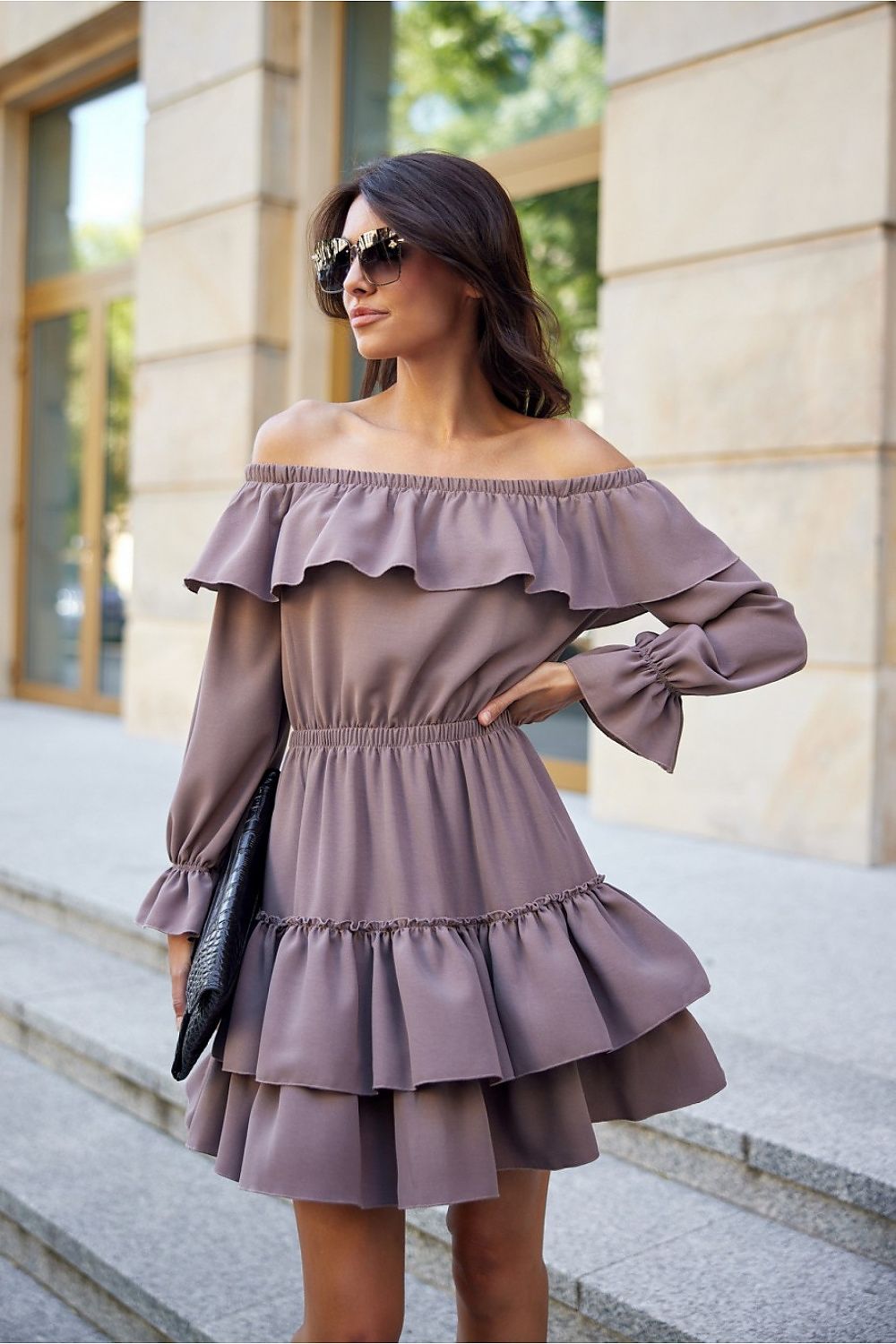 Elegant Morella Spanish-style mini dress by Roco Fashion featuring adjustable neckline and charming ruffles.
