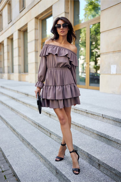 Luxurious Morella mini dress with flared skirt and ruffles, designed by Roco Fashion for timeless elegance.