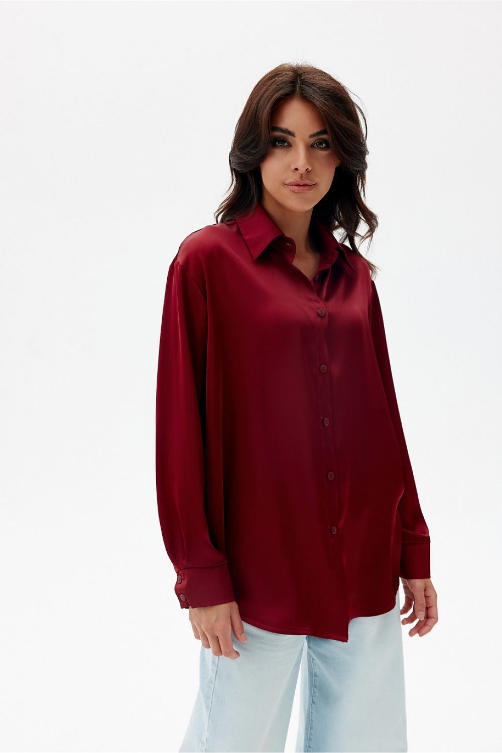Beautifully draped oversized satin shirt by Roco Fashion, featuring a classic collar and adjustable button closure for a refined look.