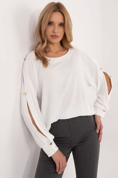 Elegant Italy Moda blouse featuring a sophisticated boat neck and stylish slit long sleeves, crafted from high-quality fabric for a luxurious look.