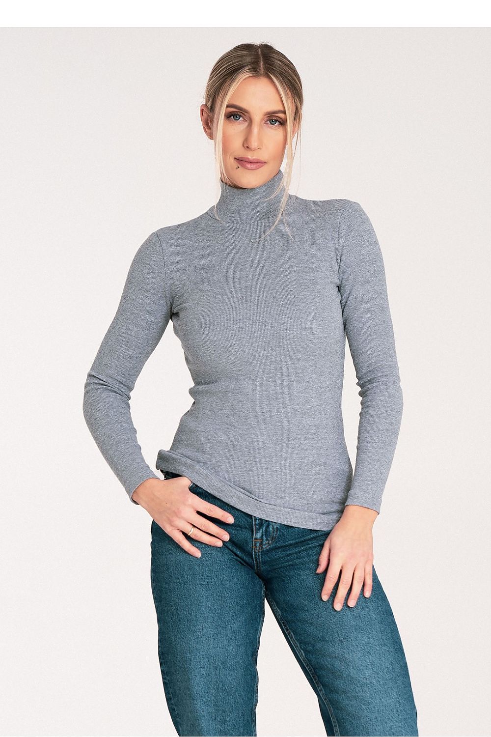 Detail of the lightly ribbed design on Figl’s luxury cotton turtleneck, perfect for elegant layering.