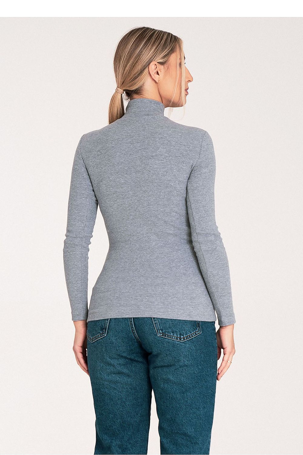 Fashion-forward outfit featuring Figl's luxury cotton turtleneck, exemplifying modern chic style.