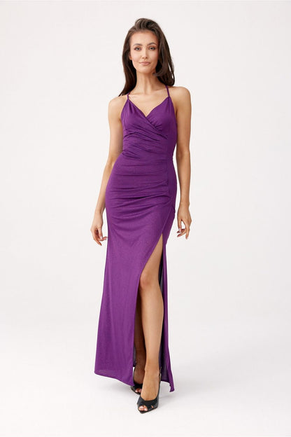 Elegant open back strapless maxi dress by Roco Fashion showcasing a shimmering glitter fabric and alluring leg slit, perfect for evening events.