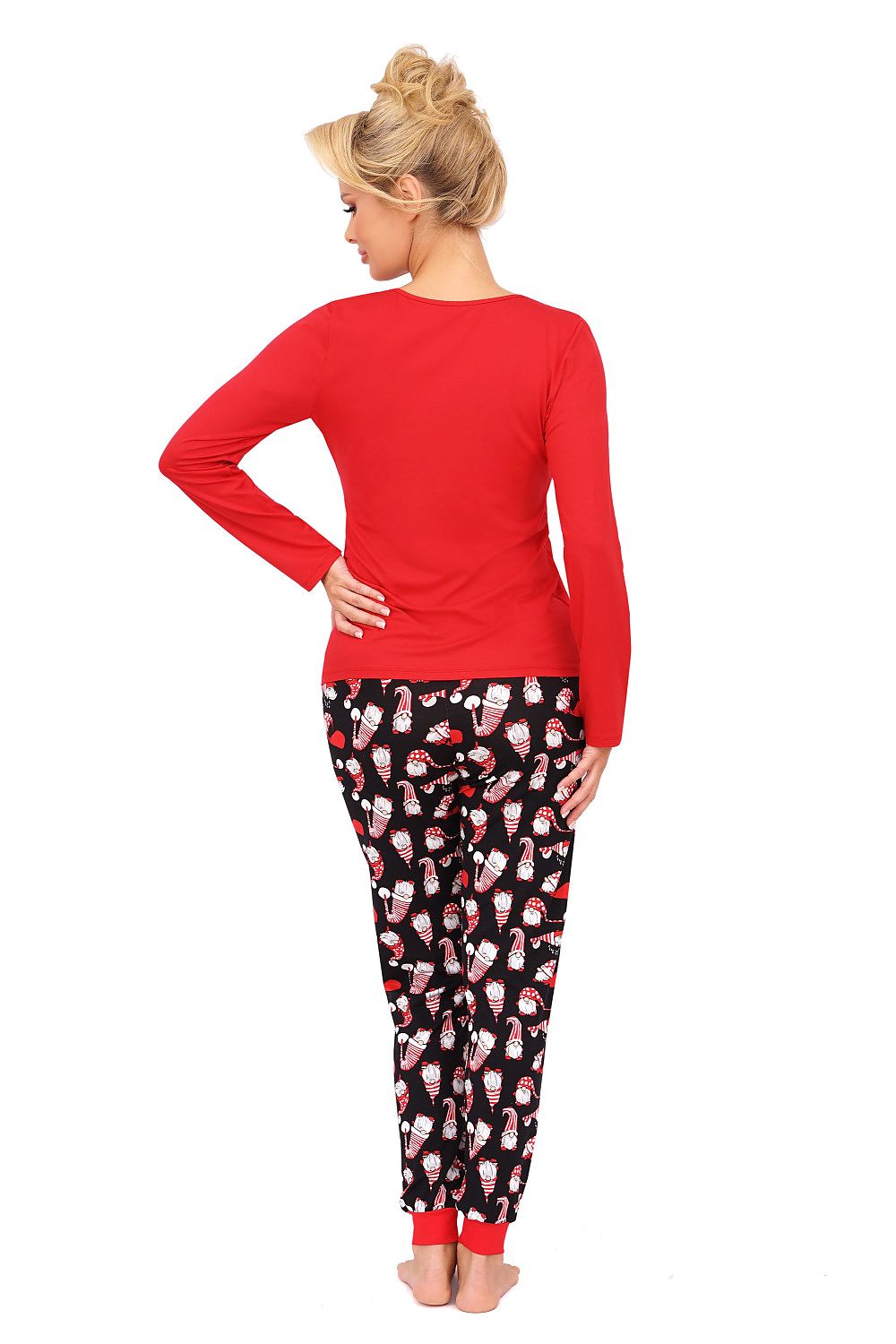 Chic women's Christmas pyjamas from Donna, showcasing a comfortable long sleeve V-neck top paired with festive print pants, crafted from breathable cotton fabric.