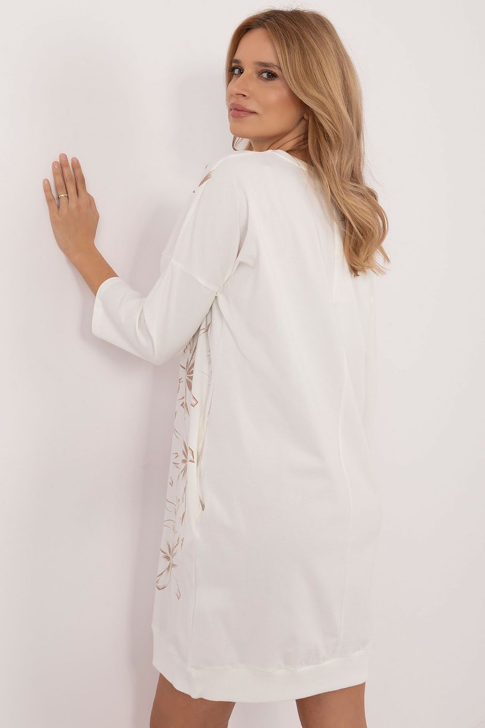 Stylish floral print cotton-spandex tracksuit daydress by Relevance, showcasing a feminine design with subtle floral detailing for elegant comfort.