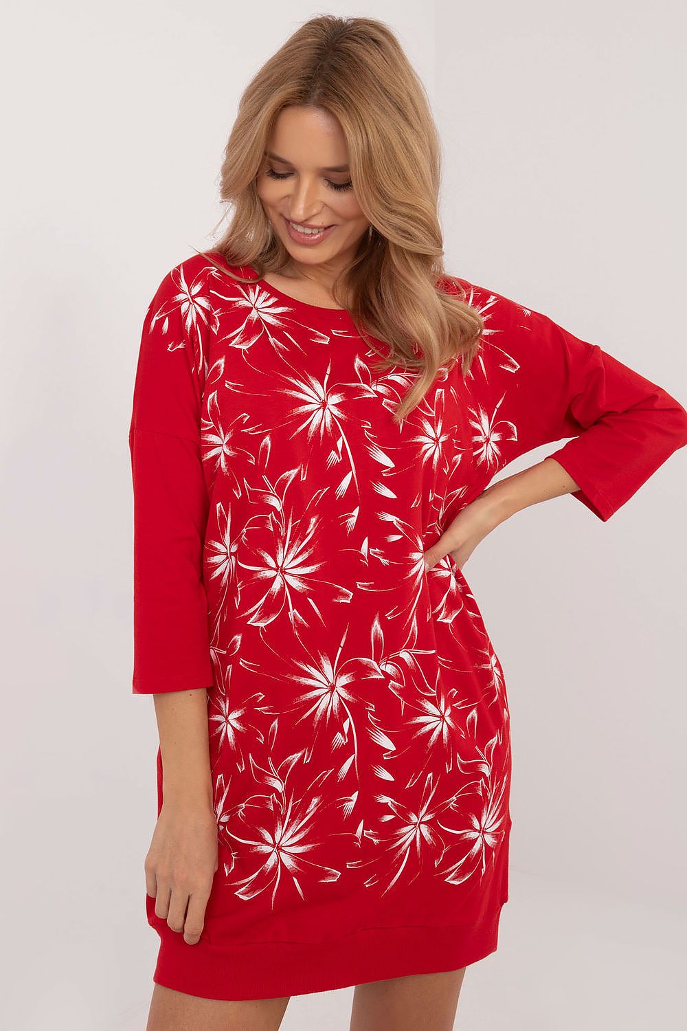 Close-up of the cotton-spandex tracksuit daydress by Relevance, highlighting the luxurious fabric texture and beautiful floral patterns for women's casual fashion.
