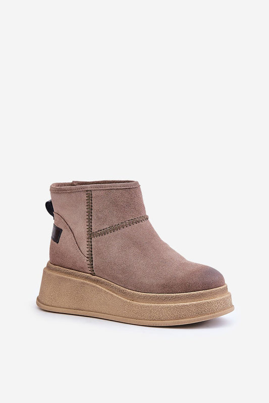 Luxury women's snow boots with fur lining from Step in Style, featuring a stylish platform and wedge heel design, ideal for winter elegance.