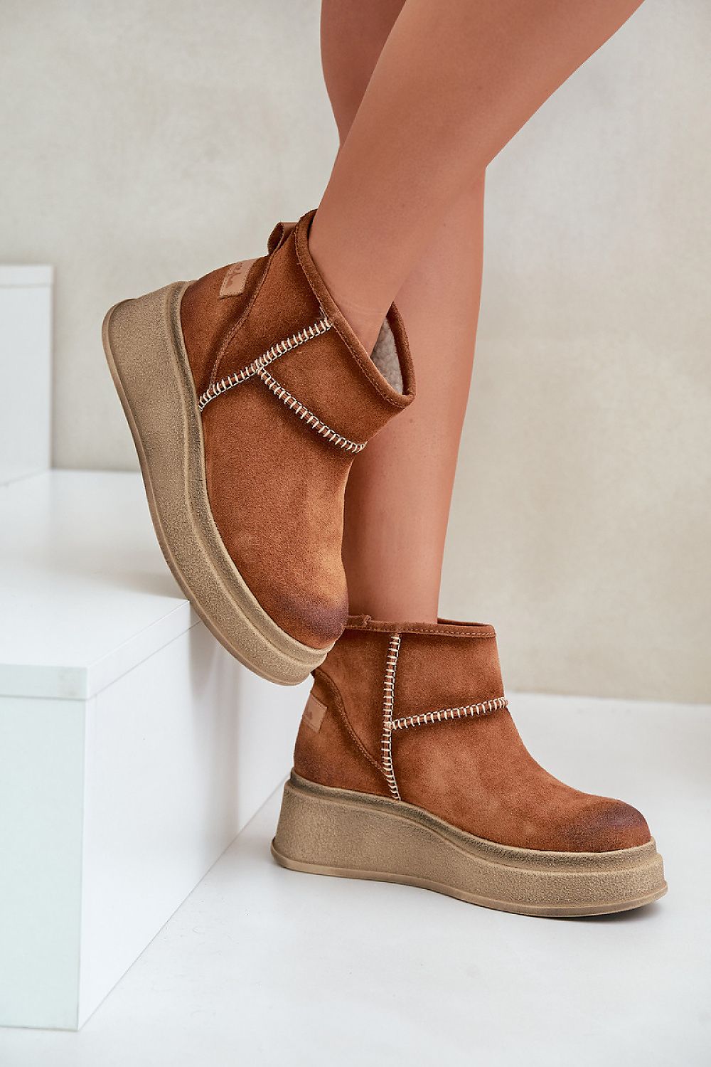 Stylish women's snow boots with a chic platform and wedge heel, made from luxurious suede with fur lining, by Step in Style, available in EU sizes 36-41.