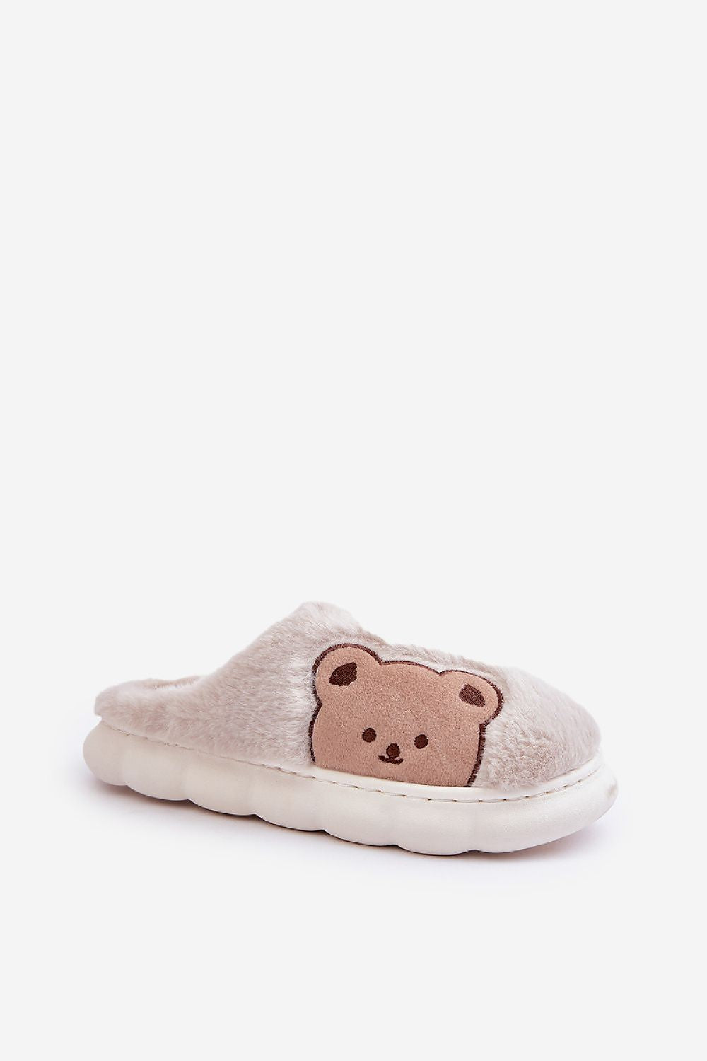 Thick platform of Luxury Teddy Bear Slippers by Step in Style, designed for warmth and comfort during cold days.