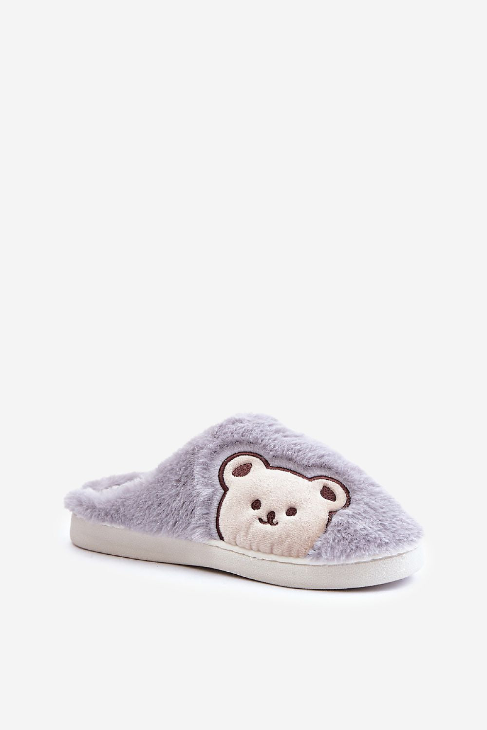 Cozy and elegant fur slippers for women with a delightful teddy bear design, offered by Step in Style for a luxurious home experience.