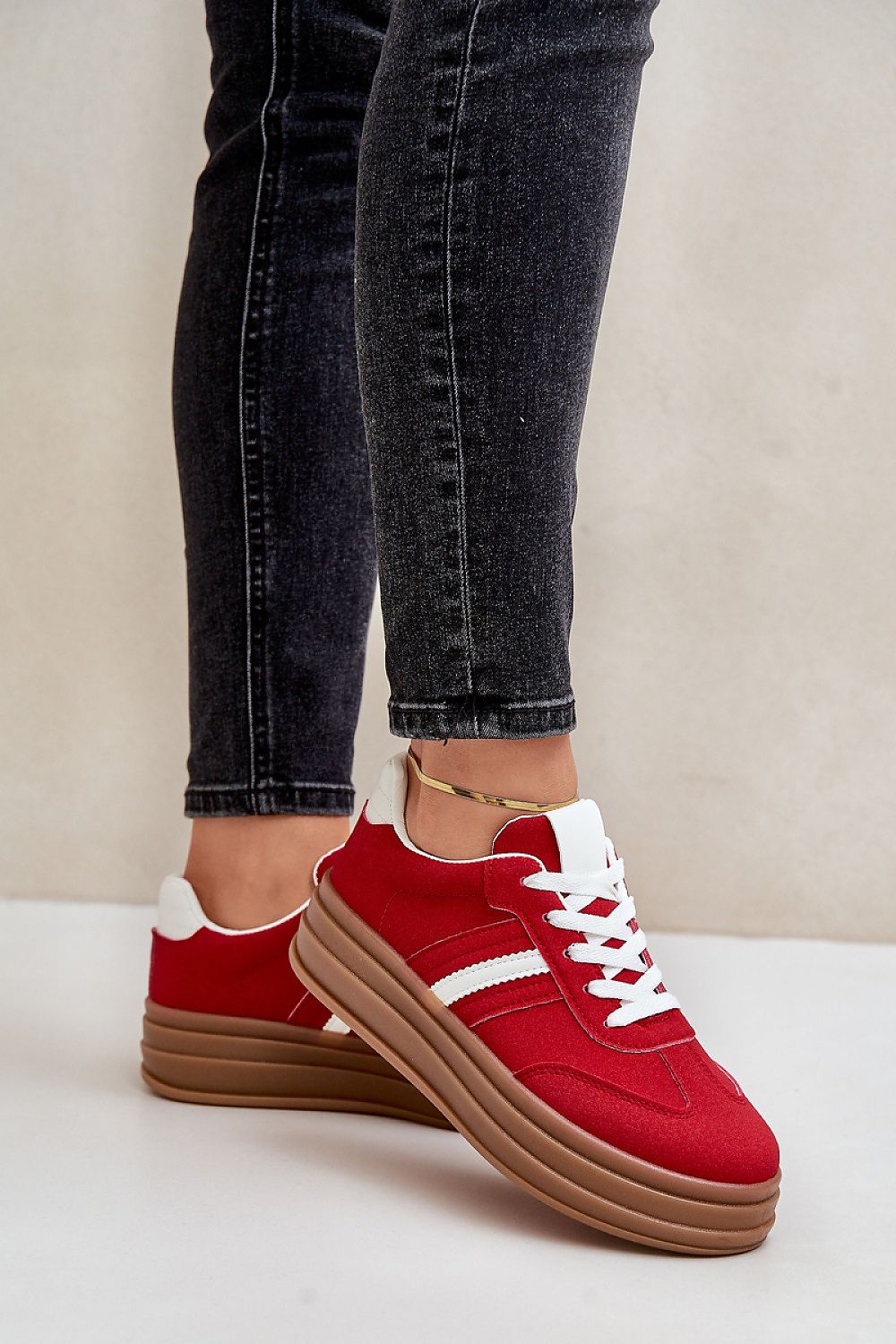 Elegantly displayed eco leather women's platform sneakers, embodying contemporary luxury and comfort, offered by Step in Style.