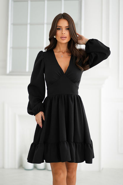 Elegant Bicotone cocktail dress featuring long sleeves and a flared skirt, perfect for special occasions.
