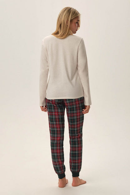 Elegant Henderson Florencia Christmas Pyjamas featuring a stylish beige top with winter graphic design and sophisticated checkered pants, available in sizes S to XXL for a luxurious and comfortable festive feel.