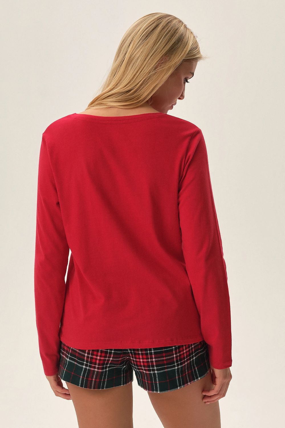 Elegant Henderson men’s Christmas pyjama set showcasing cheerful Christmas graphics and sophisticated checked shorts, perfect for holiday relaxation.