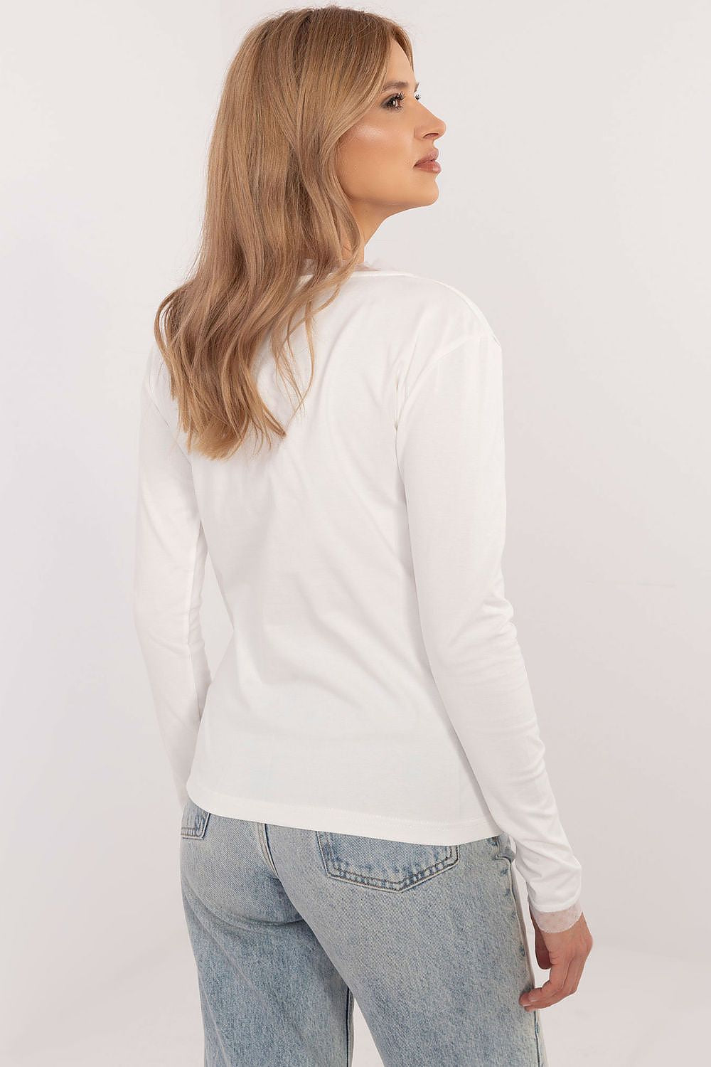 Sophisticated women's blouse featuring classic round neckline and long sleeves, crafted by Factory Price.