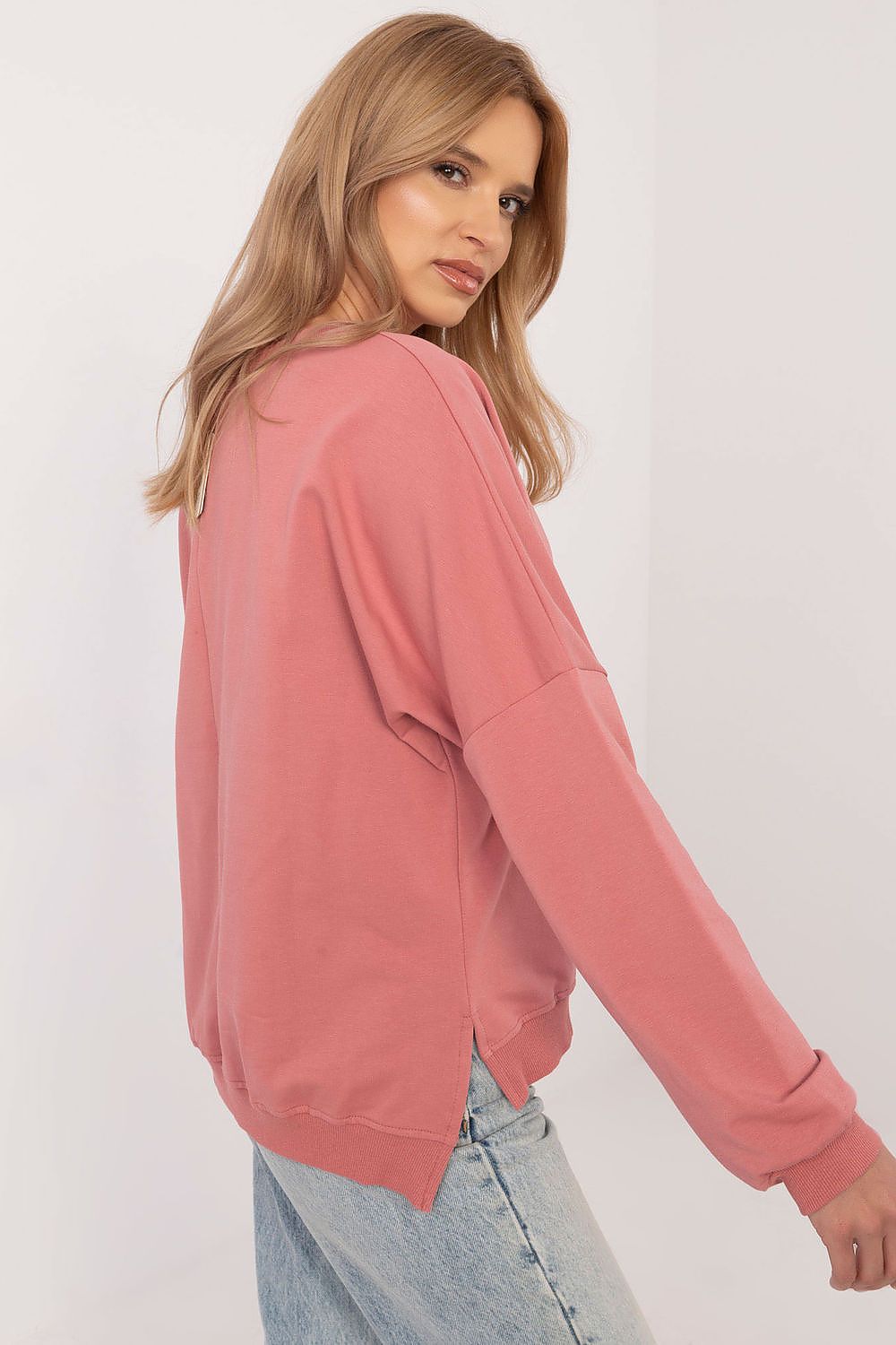 Chic long-sleeve women's sweatshirt available in sizes S-XL by Factory Price, showcasing elegant rhinestone details and a classic round neckline.