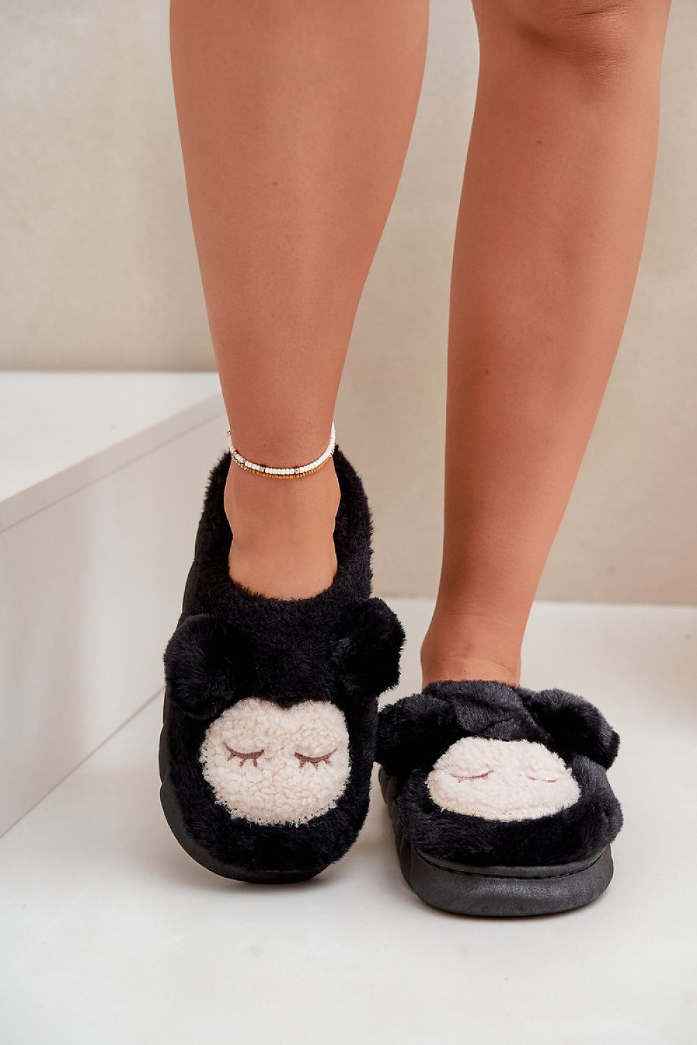 Chic thick-soled luxury winter slippers for women, ensuring stability and style, brought to you by Step in Style.