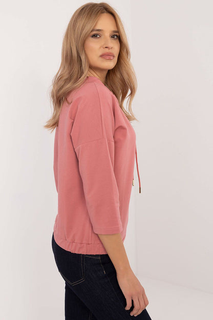 Chic and comfortable women's blouse made from high-quality cotton blend, featuring a unique print, available from Factory Price in sizes S to XL.