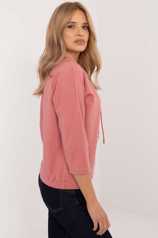 Chic and comfortable women's blouse made from high-quality cotton blend, featuring a unique print, available from Factory Price in sizes S to XL.