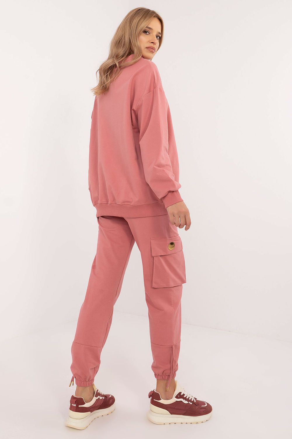 Elegant women's tracksuit ensemble from Factory Price, showcasing a comfortable sweatshirt and matching high-waisted trousers, ideal for a stylish and versatile look.
