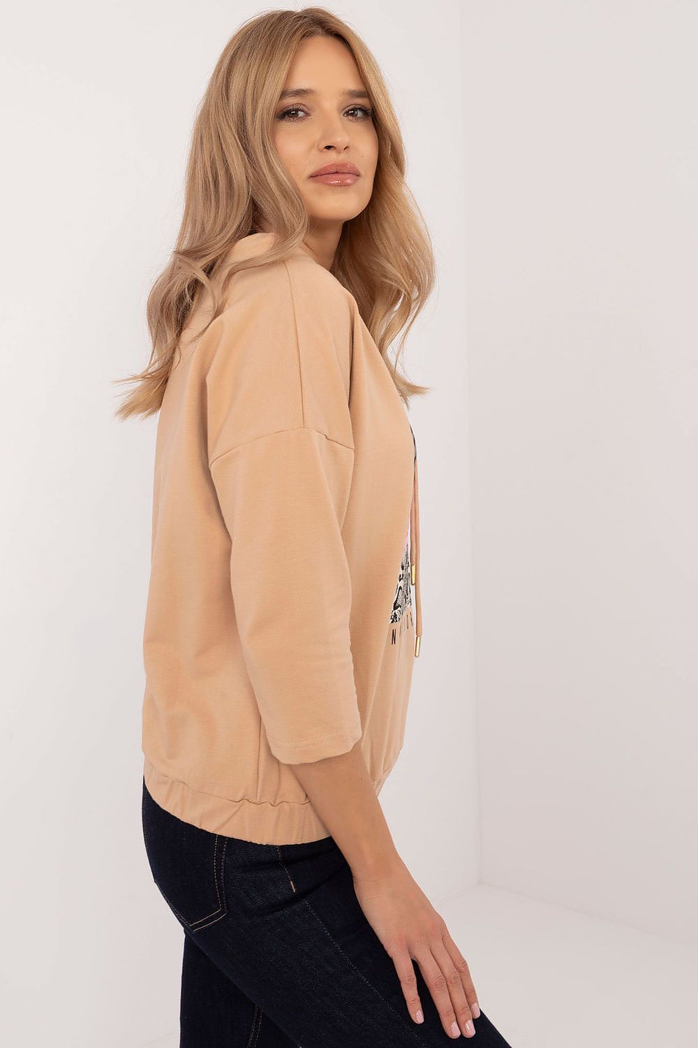 Stylish 3/4 sleeve cotton blouse with intricate designs from Factory Price, perfect for relaxed yet sophisticated daily looks.