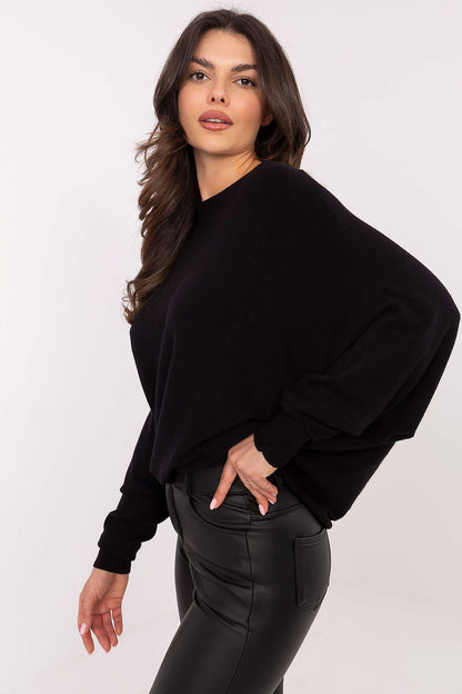 Chic oversized women's sweater by Italy Moda featuring a stylish boat neckline, perfect for casual elegance.