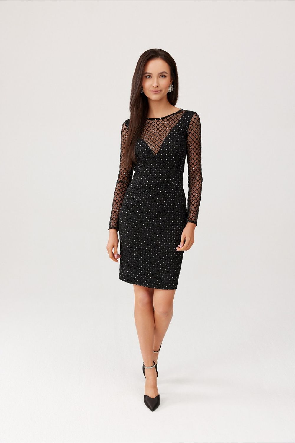 Back view of the Roco Fashion checkered dress with a stylish zipper closure, designed to flatter the figure and enhance elegance.