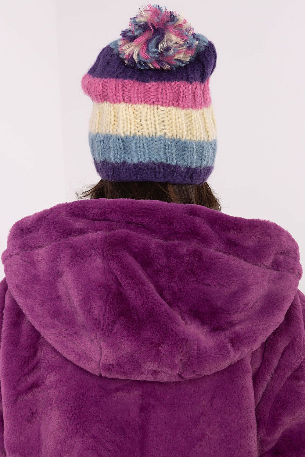 Stylish winter beanie cap by AT featuring vibrant striped design and fluffy pom-pom for luxury warmth in cold weather.