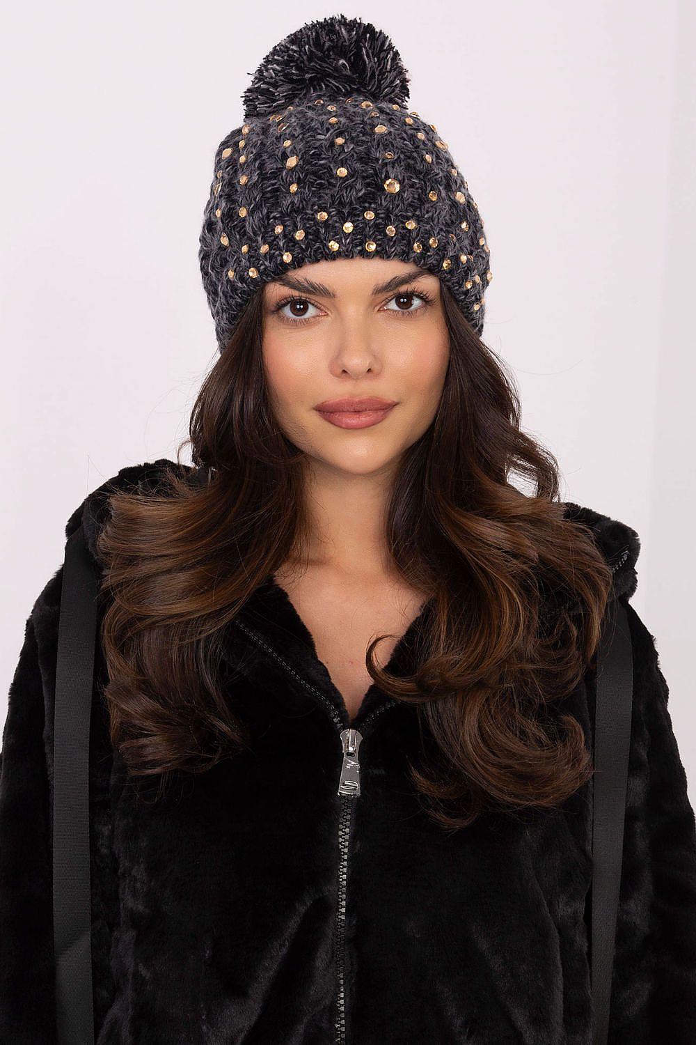 Elegant Women's Beanie by AT, featuring a fluffy pom-pom and sparkling zircon accents, crafted from soft acrylic for warmth and style during winter.