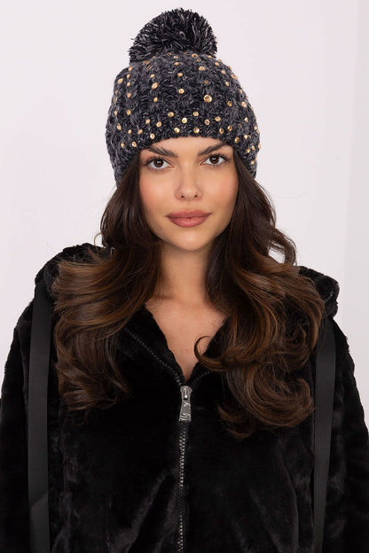 Elegant Women's Beanie by AT, featuring a fluffy pom-pom and sparkling zircon accents, crafted from soft acrylic for warmth and style during winter.