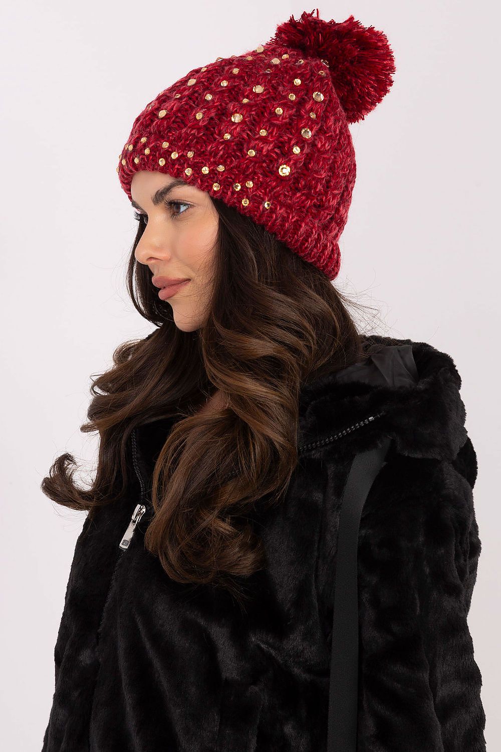 Chic winter hat featuring a luxurious design, soft acrylic material, and sparkling zircons by AT, ideal for elegant occasions.