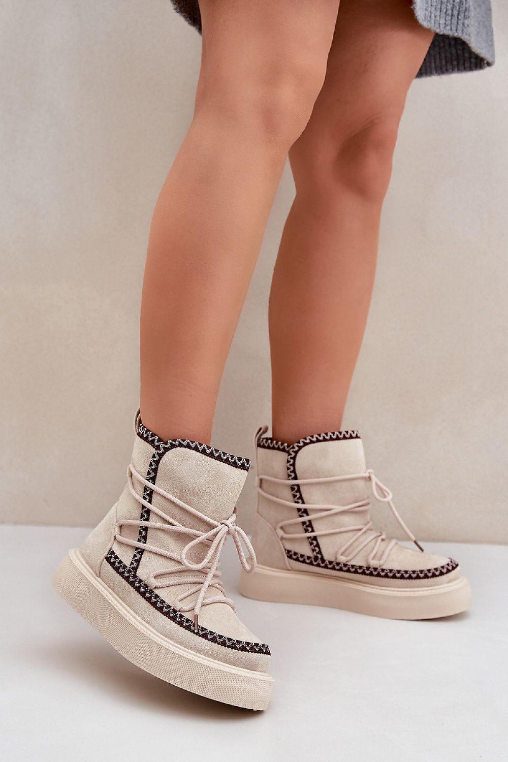 Stylish insulated snow boots for women by Step in Style, featuring intricate embroidery and a comfortable platform for cold weather fashion.